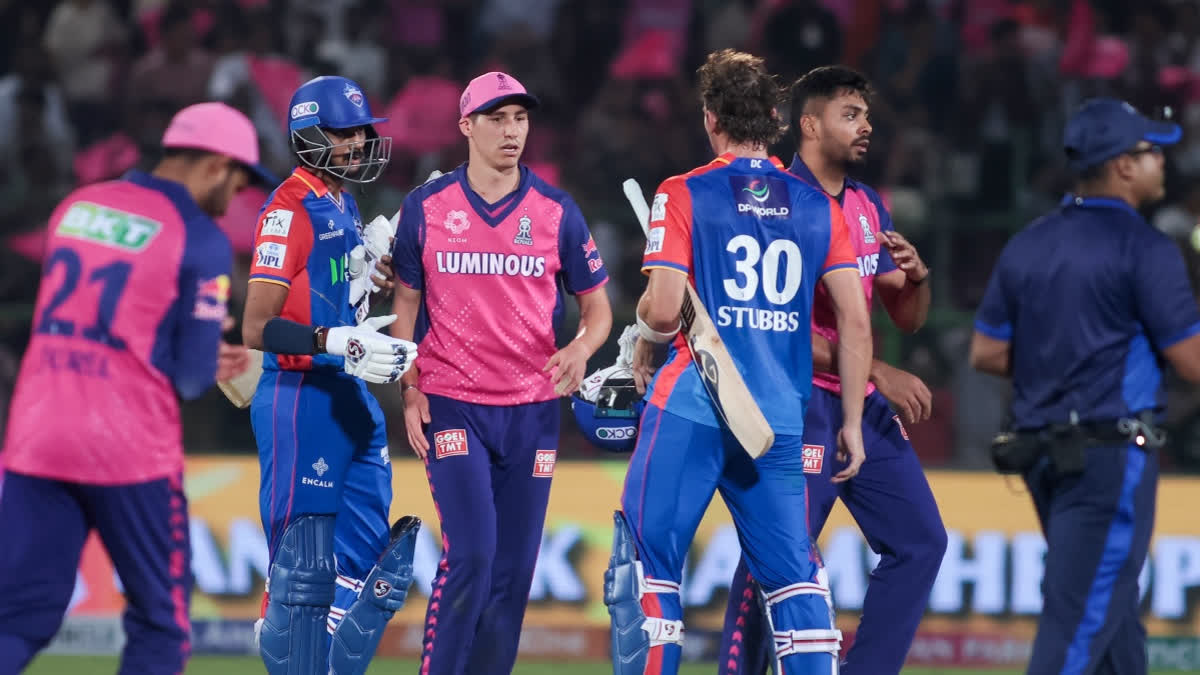 Players of Rajasthan Royals and Delhi Capitals greet each other at the end of the IPL cricket match in Jaipur on Thursday, March 28, 2024.
