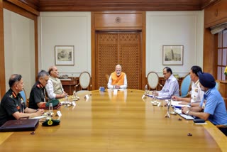 In this image provided by PMO, Tuesday, April 29, 2025, Prime Minister Narendra Modi holds meeting with Defence Minister Rajnath Singh, NSA Ajit Doval, CDS General Anil Chauhan, Army Chief Gen