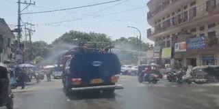 Water sprinkled by tankers on roads due to intense heat in Jammu