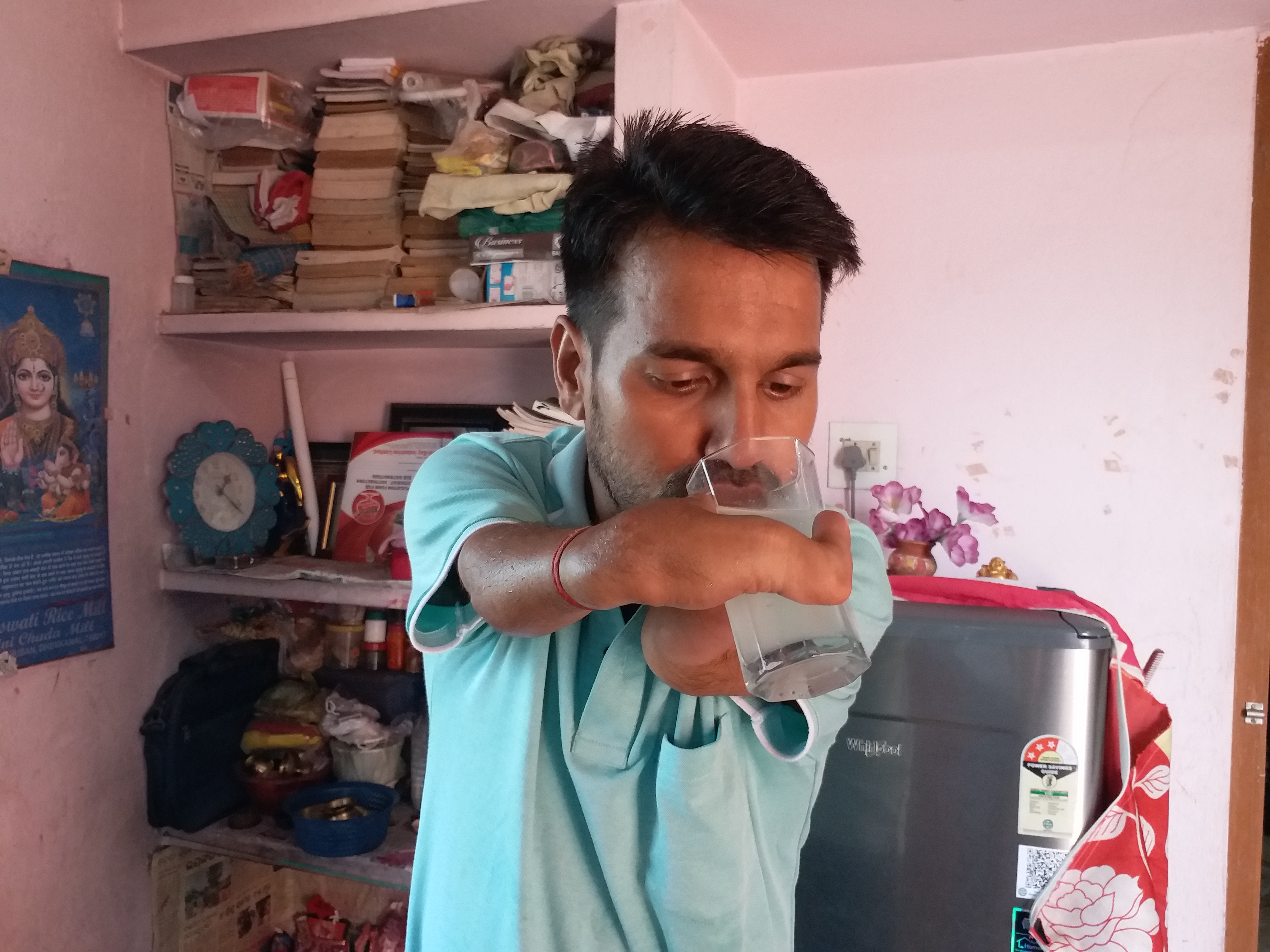 physically challenged gyana das drinking water