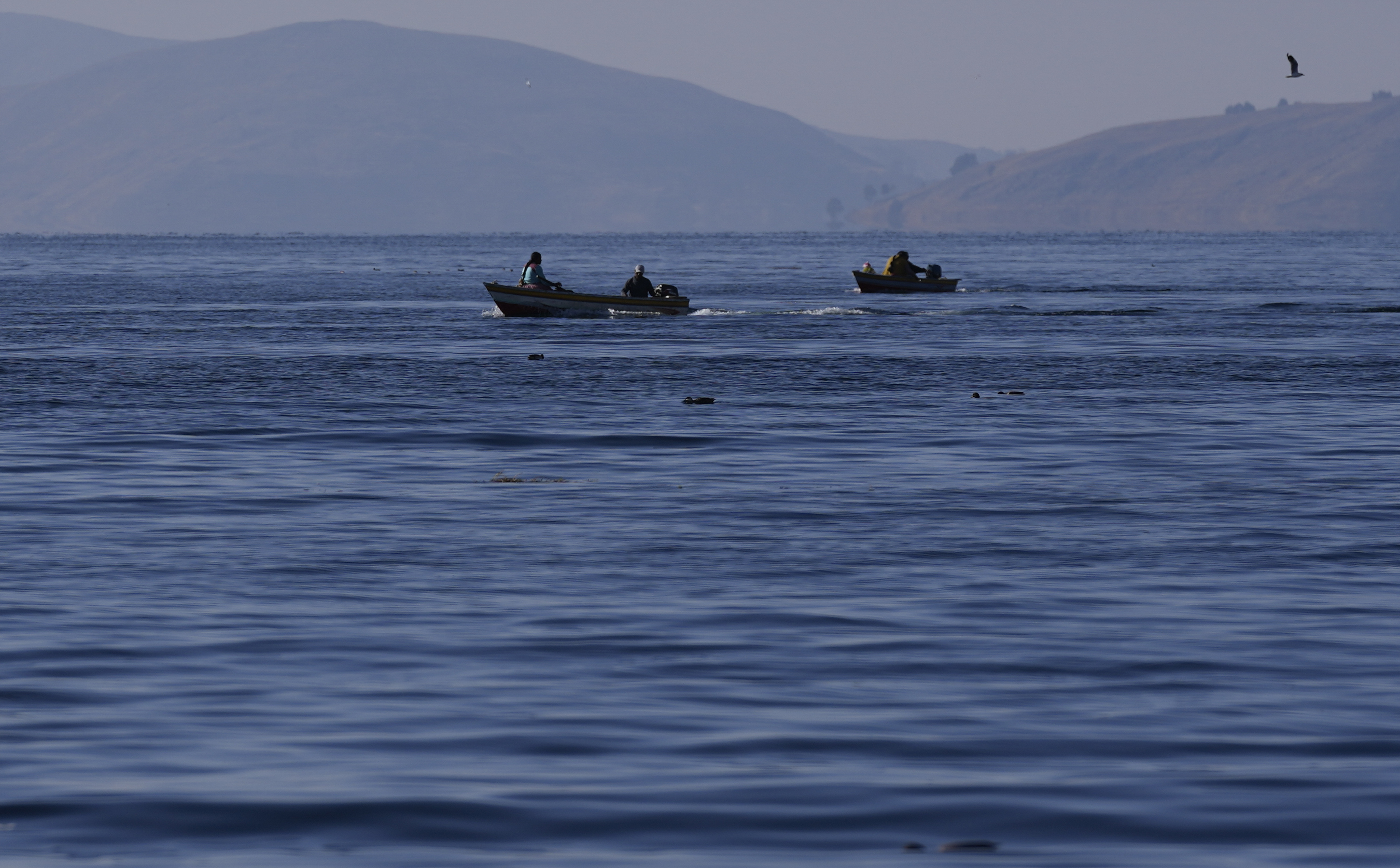 The lake's low water level is having a direct impact on the local flora and fauna and is affecting local communities that rely on the natural border between Peru and Bolivia for their livelihood.