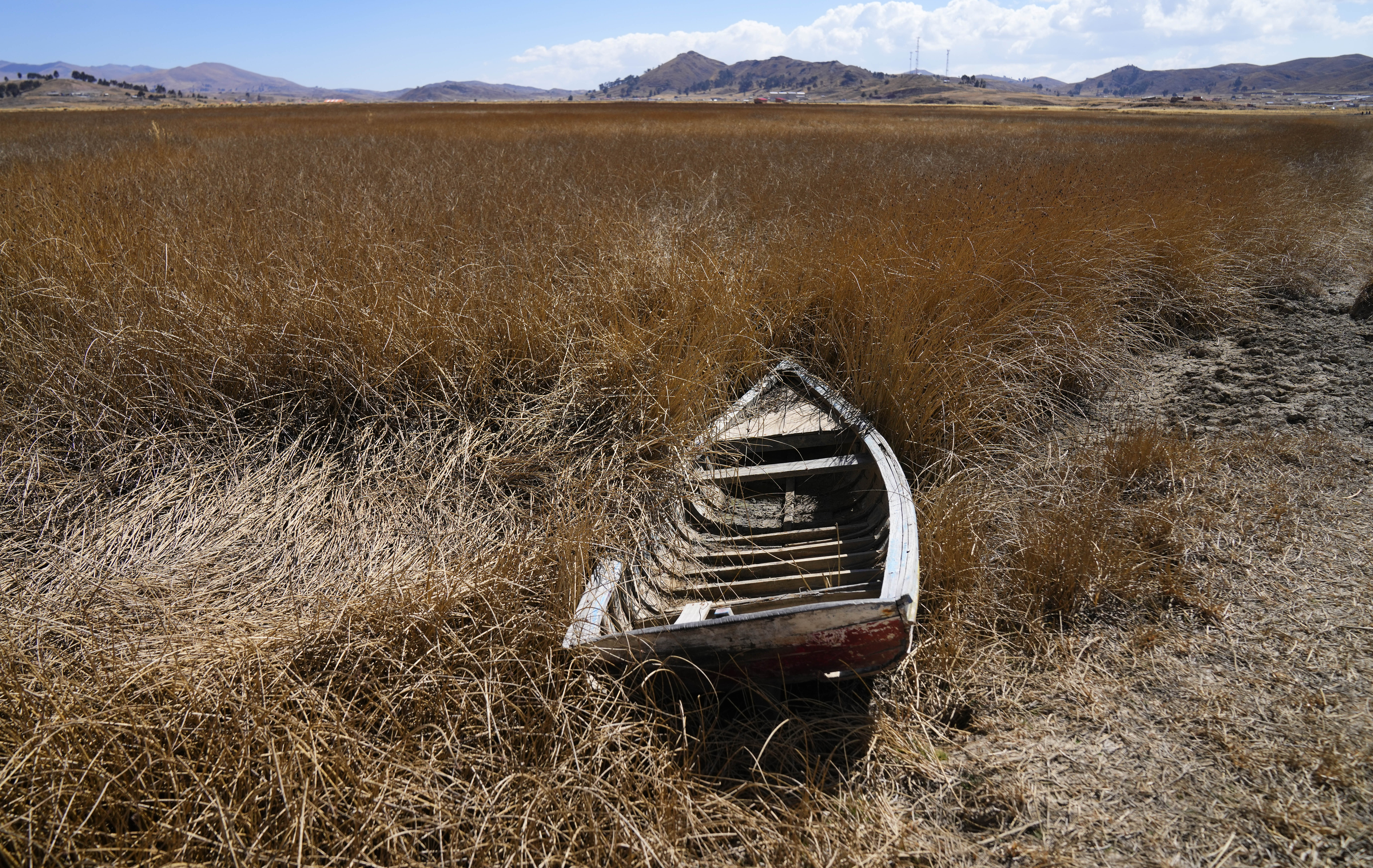 The lake's low water level is having a direct impact on the local flora and fauna and is affecting local communities that rely on the natural border between Peru and Bolivia for their livelihood.