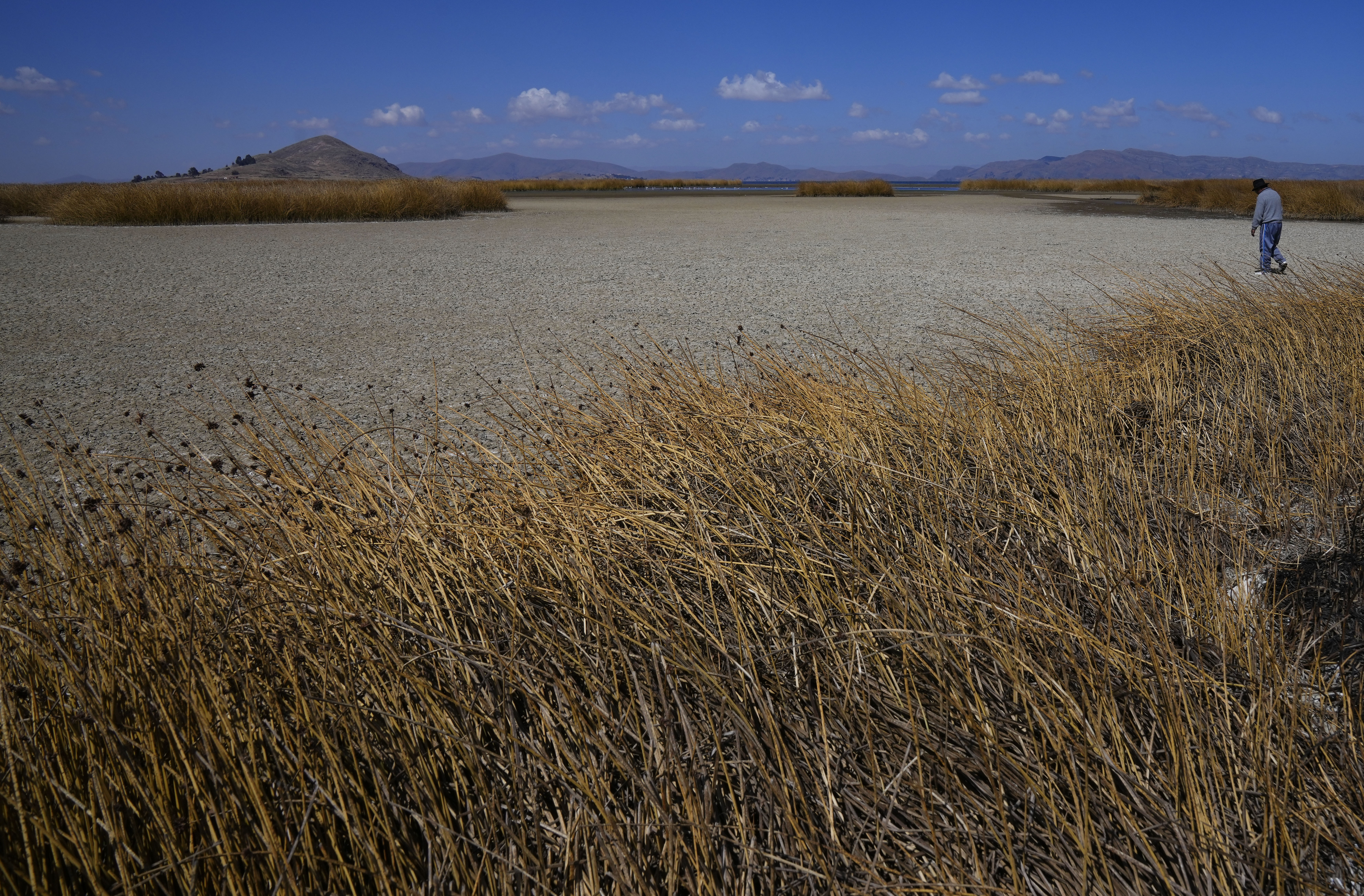 The lake's low water level is having a direct impact on the local flora and fauna and is affecting local communities that rely on the natural border between Peru and Bolivia for their livelihood.