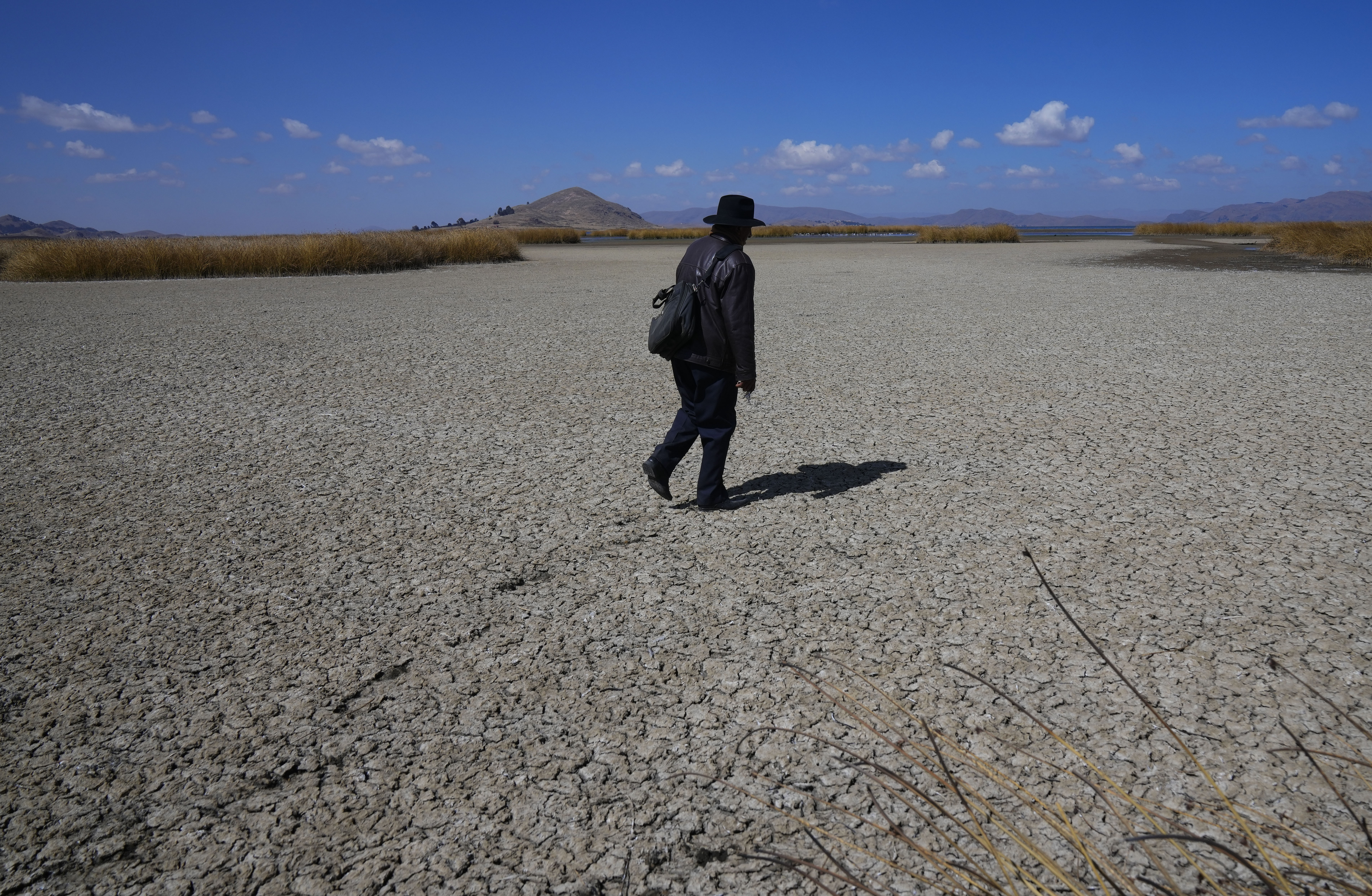 The lake's low water level is having a direct impact on the local flora and fauna and is affecting local communities that rely on the natural border between Peru and Bolivia for their livelihood.