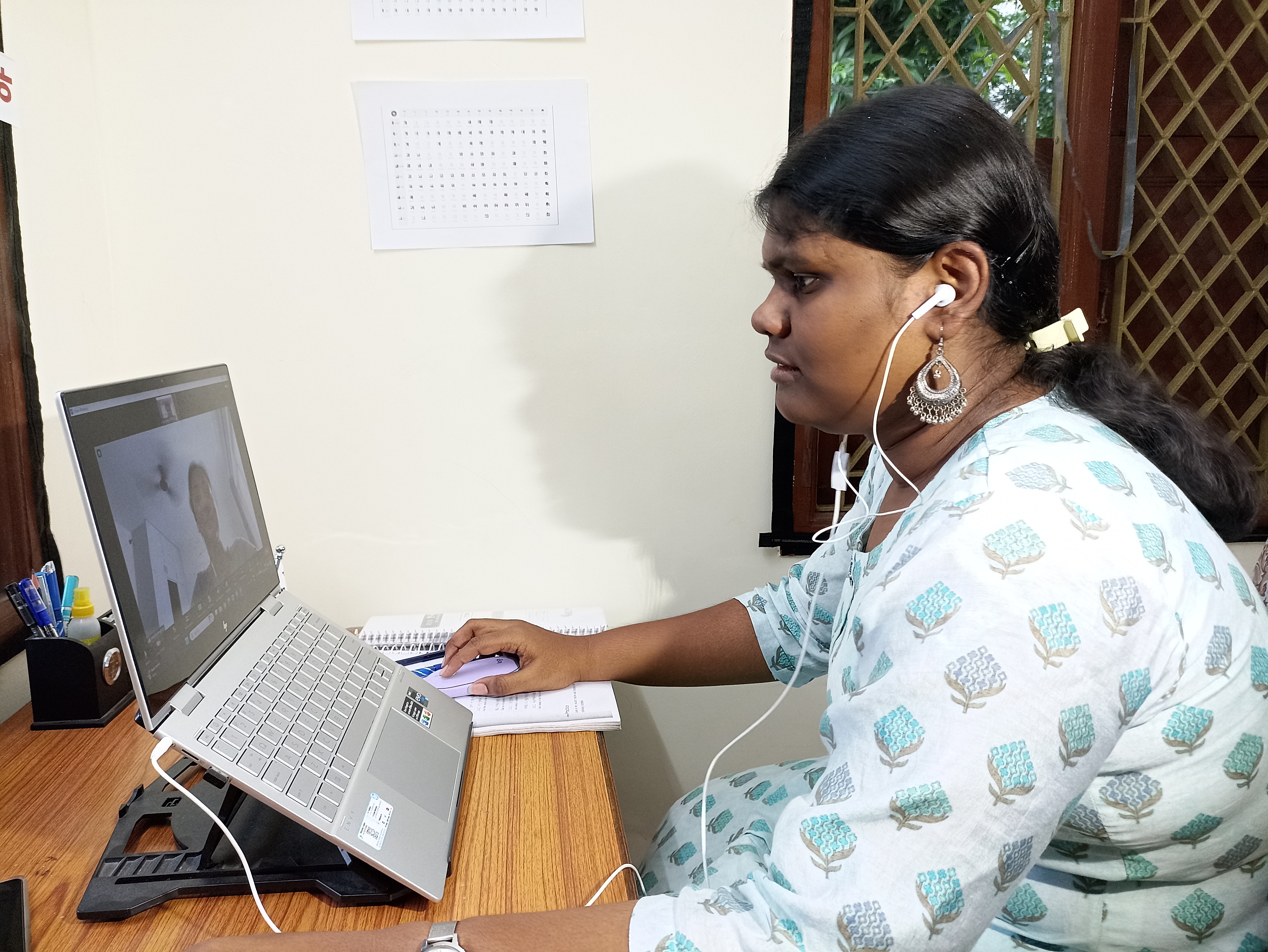 Tamil Woman Teaching Korean Language