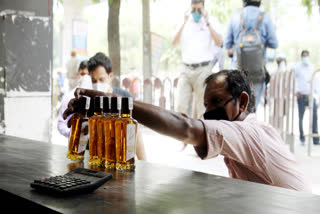 A liquor shop owner in Burhanpur was fined Rs 10,000 after a controversial banner promoting his shop went viral. The banner, which humorously suggested learning English by visiting the liquor store, violated liquor license conditions. Despite the owner's claim that the banner was placed by someone else on private land, officials deemed his explanation unsatisfactory.