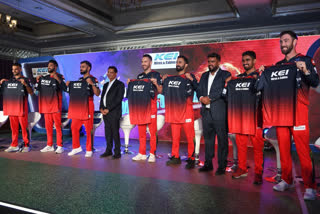 RCB players displaying their IPL jerseys