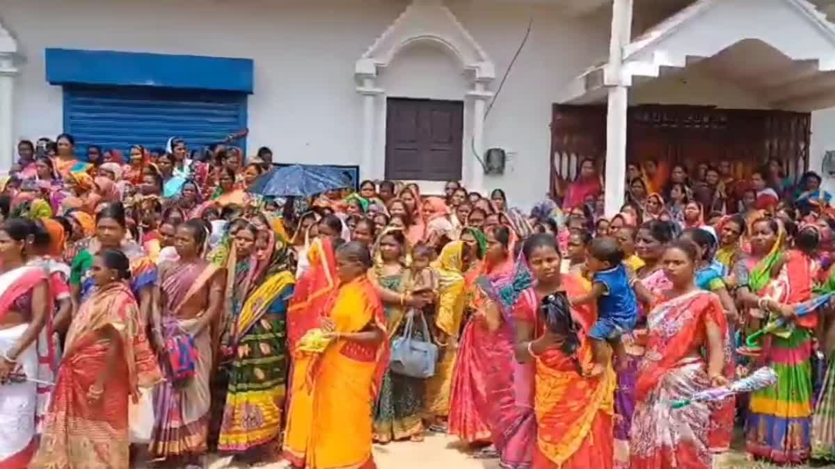 Women protest in front of Odisha Gramya Bank