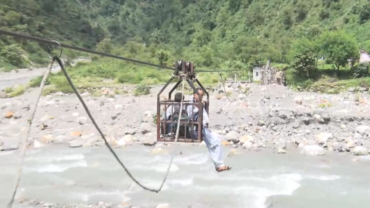 Students Cross River Via Ropeway