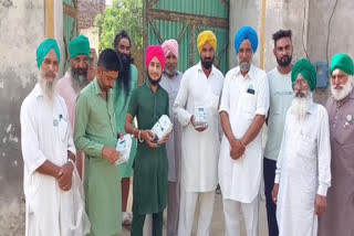 Farmers dug the smart meters installed by Powercom in Bhaini Bagha village of Mansa