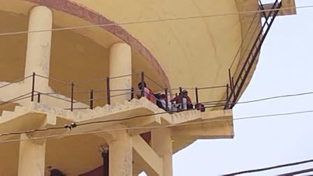 Rajasthan: Fourteen girls climb overhead water tank demanding NCC unit in college.