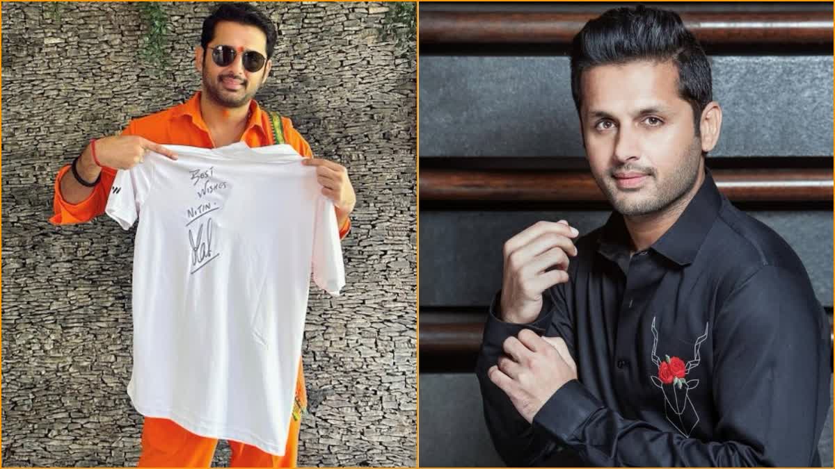 Dhoni Gifts An Autographed Shirt To Nithiin