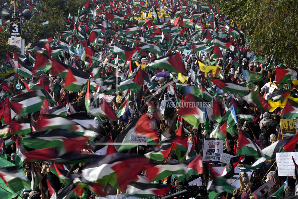 Thousands of supporters from Pakistan take part in a rally against the Israeli airstrikes on Gaza