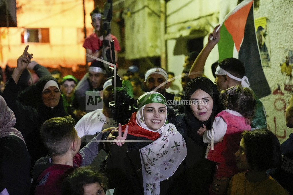 Aseel al-Titi, wearing a Hamas headband, a former Palestinian prisoner who was released by the Israeli authorities