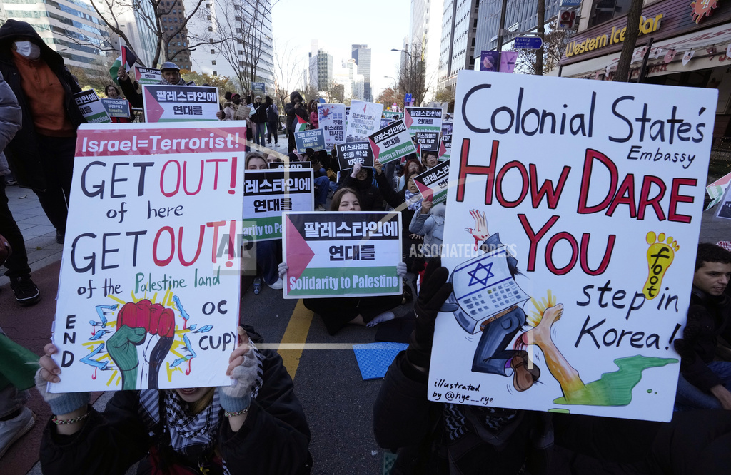 Supporters for Palestinian people stage a rally near Israeli embassy in Seoul, South Korea