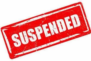Two officials suspended