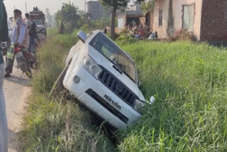 A luxury vehicle fell into the drain during a dispute in Jandiala Guru of Amritsar