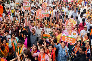 Bharatiya Janata Party (BJP) supporters celebrate the victory of BJP-led Mahayuti in the Maharashtra Assembly elections, at the BJP office in Thane.