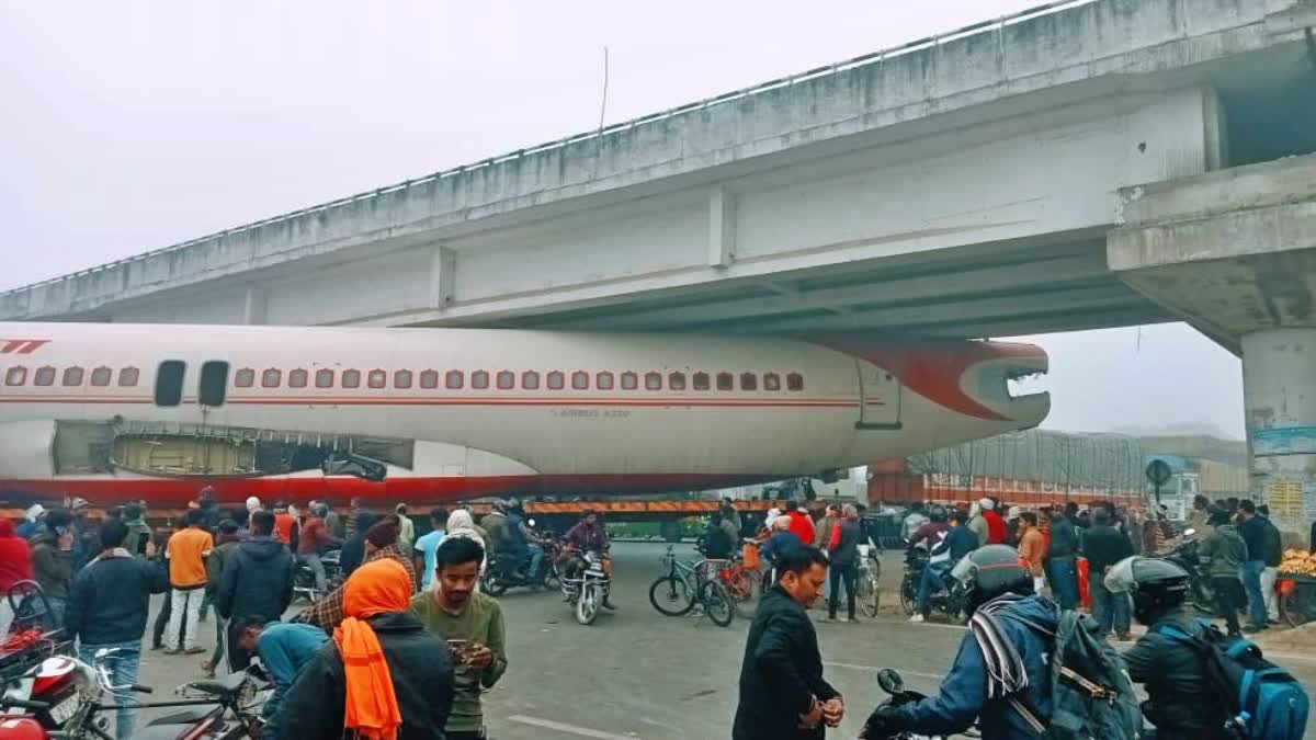 airplane-gets-stuck-benath-overbridge-in-bihar