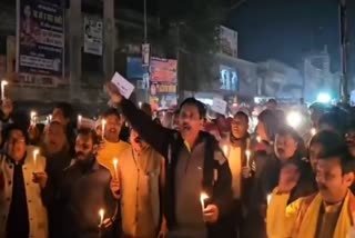candle march in koderma