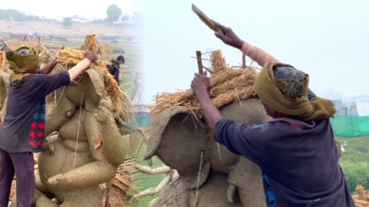 Craftsman preparing idol for Kumbh Mela at Prayagraj.