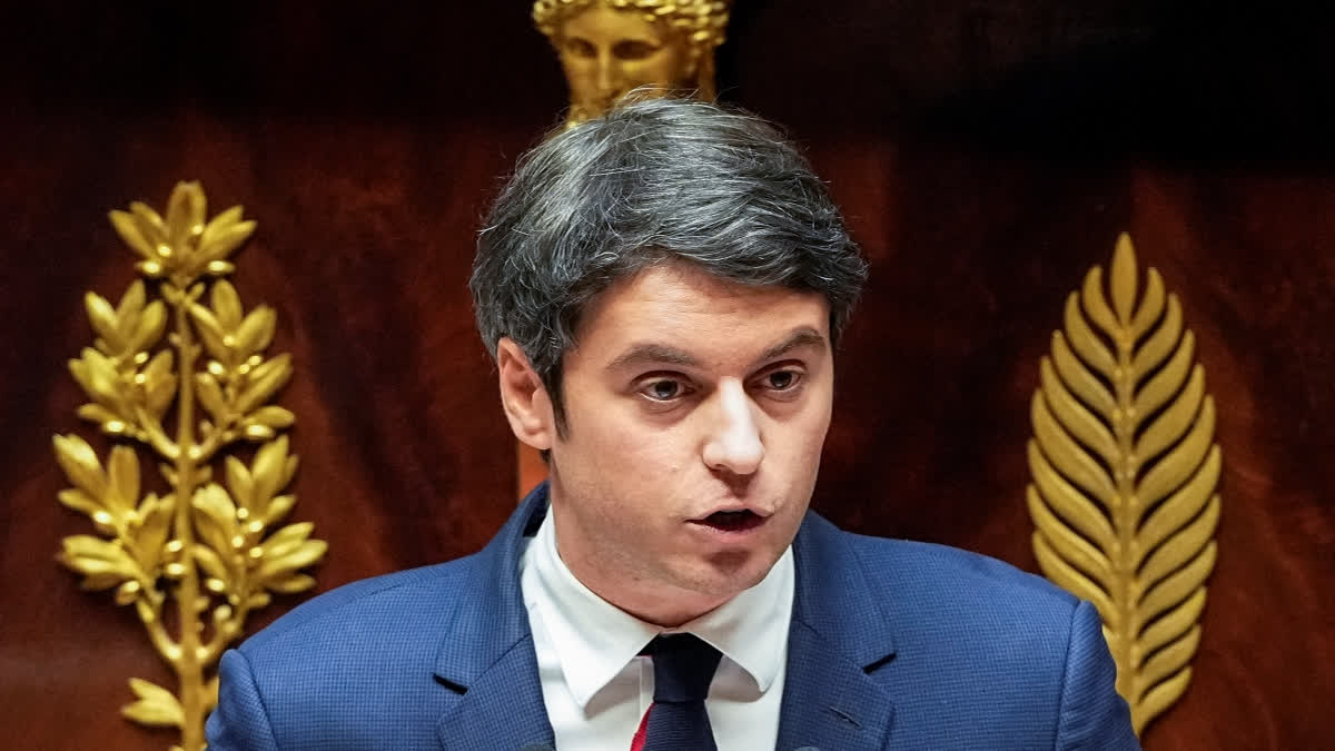 French Prime Minister Gabriel Attal speaks to the lawmakers at the National Assembly in Paris, Tuesday, Jan. 30, 2024. French Prime Minister Gabriel Attal said on Tuesday his top priority is to boost employment in his general policy address to lawmakers, three weeks after he was appointed. Attal is facing his first major challenge as angry farmers are protesting across the country and around Paris against low wages and other problems.(AP Photo/Michel Euler)