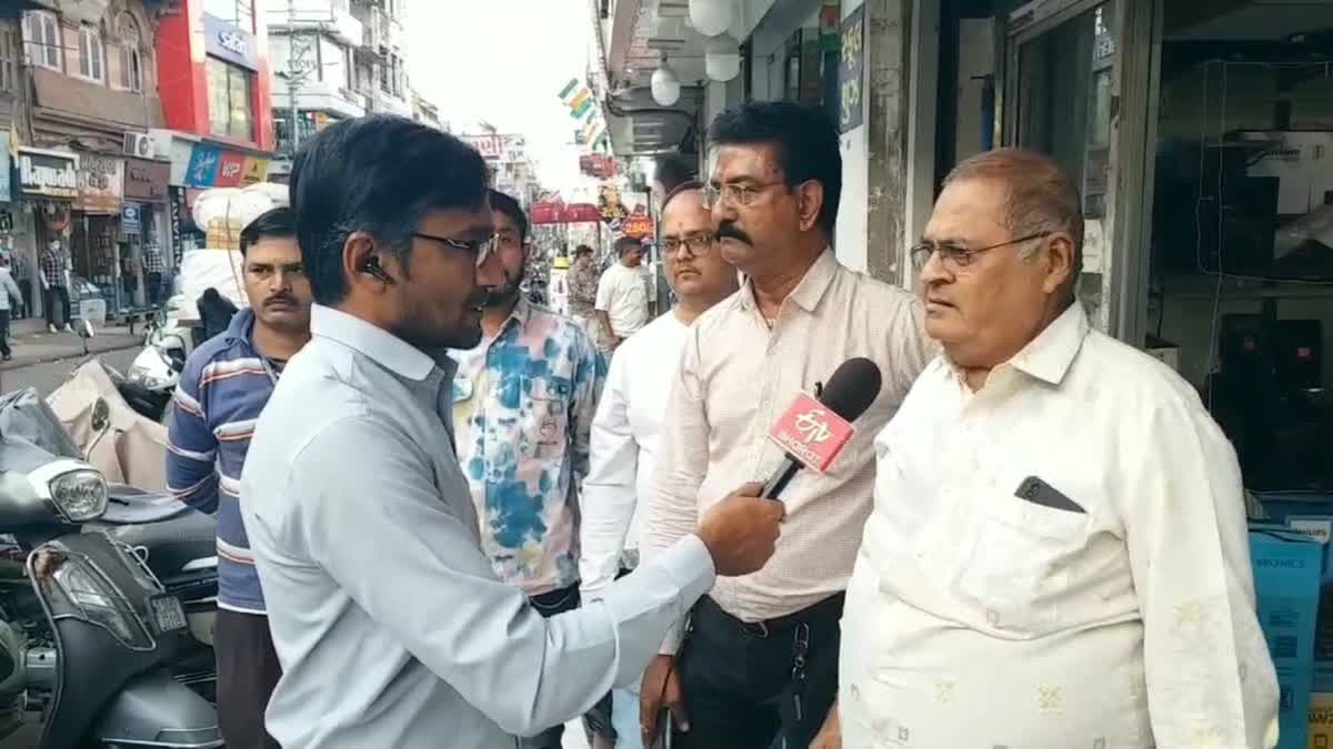 Traders in Bhavnagar demand reduced GST, improved business infrastructure, and support for the diamond industry, fearing collapse if key sectors are not revived.