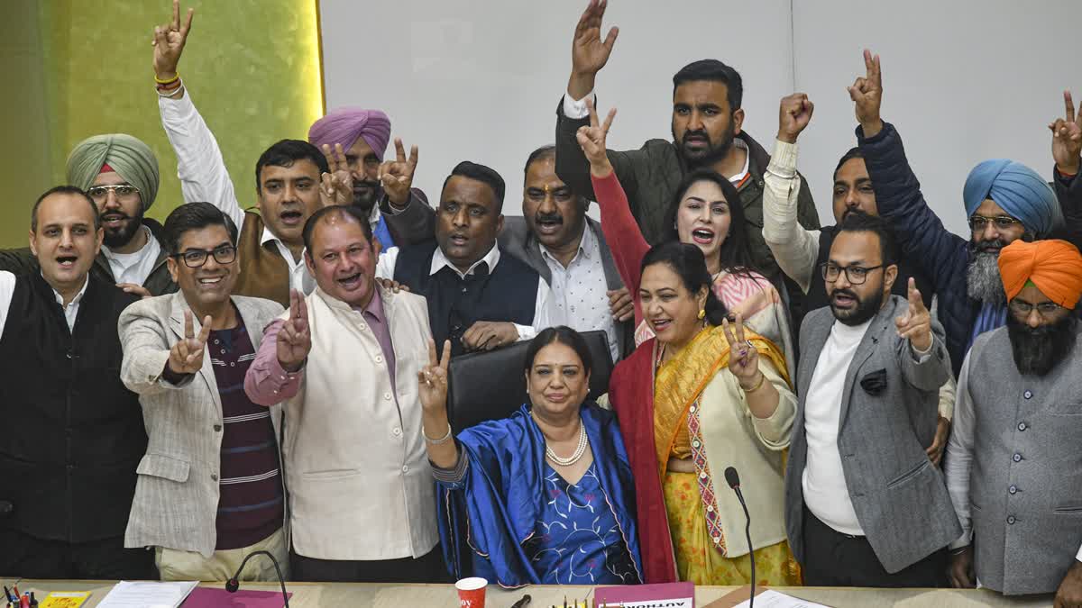 Newly elected mayor of the Chandigarh Municipal Corporation BJP's Harpreet Kaur Babla, in blue, with other party councillors after the announcement of the election results, in Chandigarh, Thursday, Jan. 30, 2025.