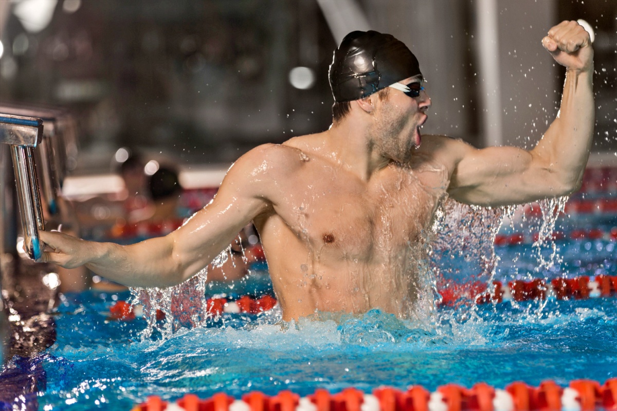 Swimmer flexes after a good session