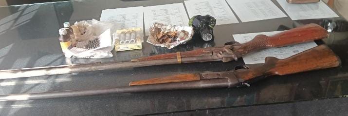 shotgun, six live cartridges, and iron balls