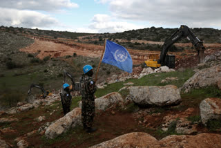 A shell burst close to three U.N. military observers and a Lebanese interpreter who were monitoring the southern Lebanese border on Saturday.