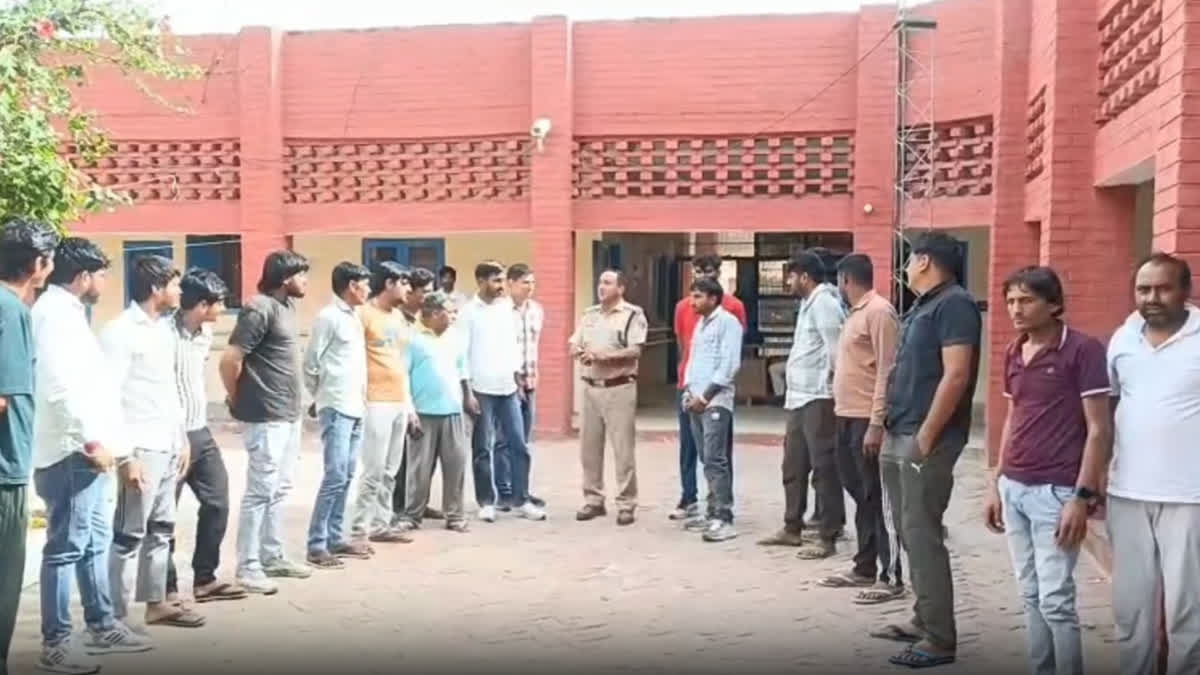 Badhra police station in-charge holding a meeting with DJ operator