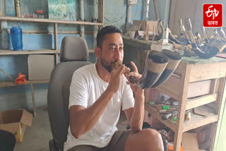 Motor mechanic has made buffalo horned papayas and various musical instruments of Bihu