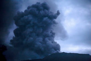 Indonesia's Mount Ruang erupts again, spewing ash and peppering villages with debris