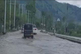 NORMAL LIFE HIT HEAVY RAINS KASHMIR  CLOSURE OF SCHOOLS  SNOWFALL AT HIGHER REACHES  FLOOD CONTROL DEPARTMENT