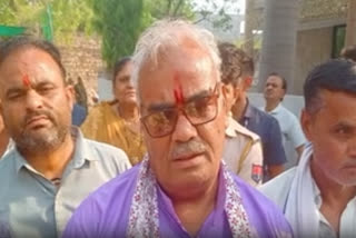 Madan Dilawar talking to the media