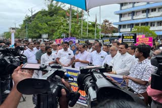 YOUTH DIED DUE TO ELECTROCUTION  യുവാവ് ഷോക്കേറ്റ് മരിച്ച സംഭവം  ACTION COMMITTEE MARCH  കുറ്റിക്കാട്ടൂർ ഷോക്കേറ്റ് മരണം