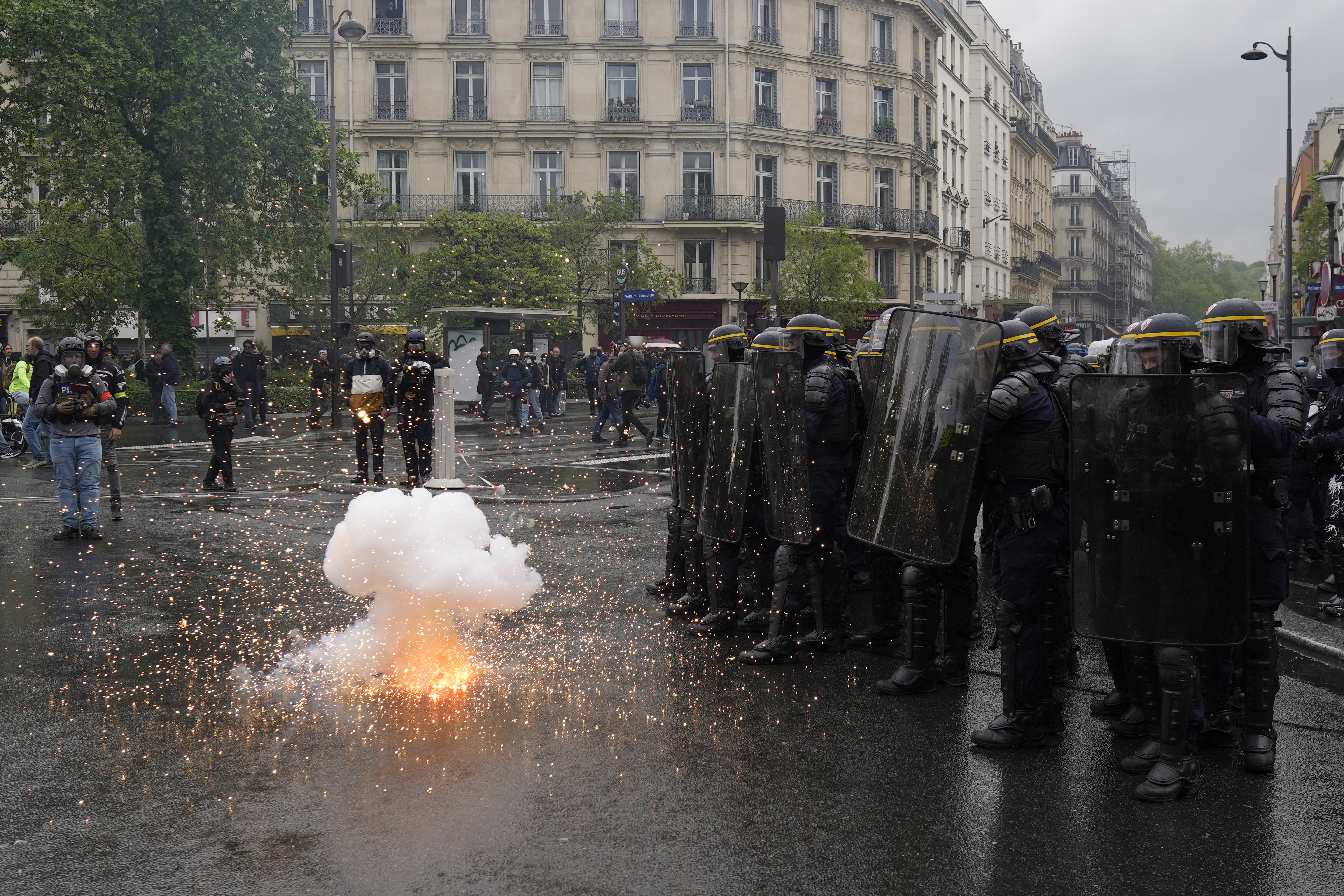French suburbs are burning. How a teen's killing is focusing anger over police tactics