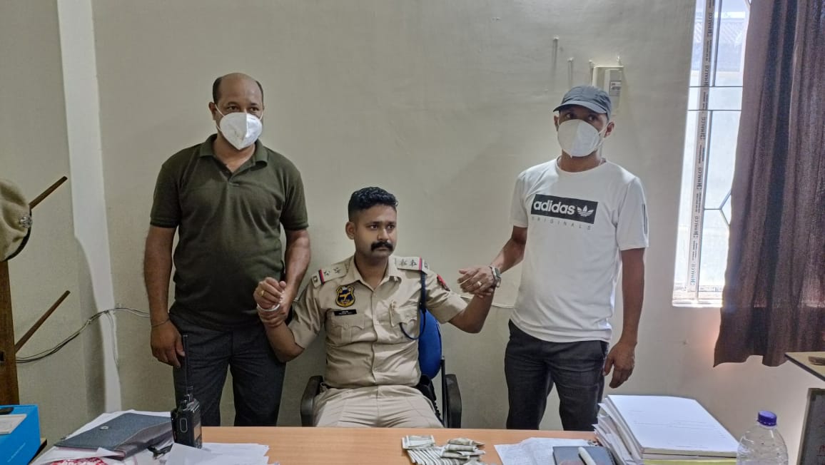 Jorhat police SI Pranab Nath arrested  for taking bribe