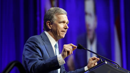 Governor Roy Cooper opted out of being considered as Kamala Harris' vice presidential running mate, citing concerns over the impact of his Republican lieutenant governor, Mark Robinson, assuming control in his absence. Cooper withdrew before the official vetting process started but expressed support for Harris' candidacy Harris' candidacy.