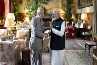 Britain's King Charles III, left, and Indian Prime Minister Narendra Modi shake hands during their meeting at the Sandringham Estate in Norfolk, England, Thursday, July 24, 2025.