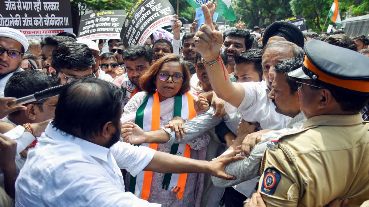 Congress MP Varsha Gaikwad being detained by Mumbai Police in Bandra