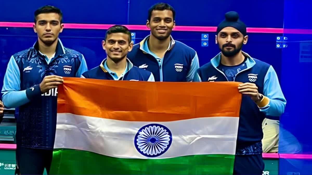 gold in mens squash team event