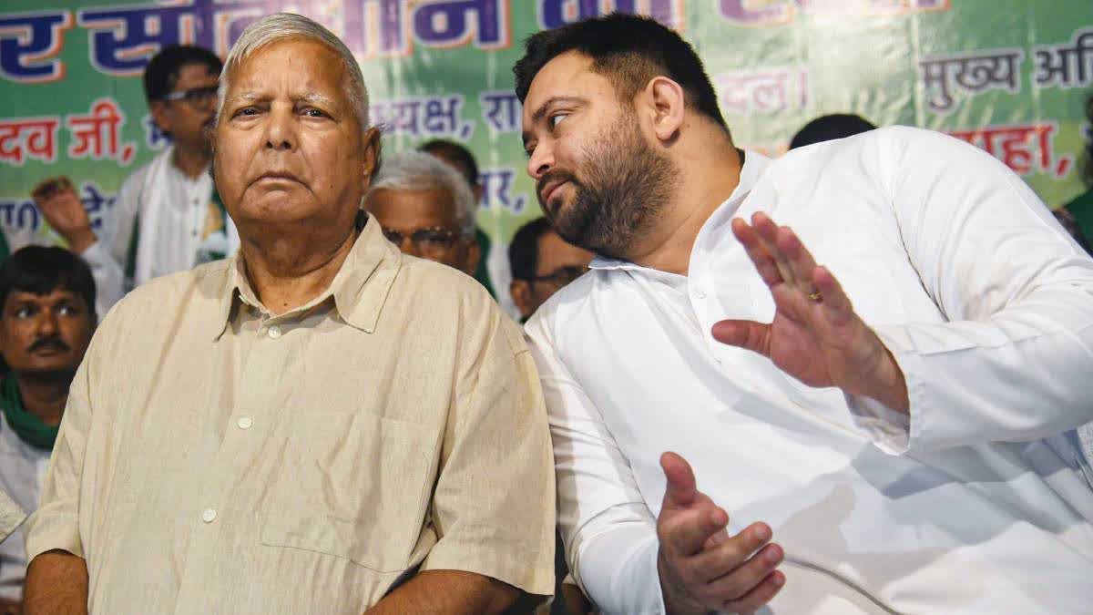 A file photo of (Left) Lalu Prasad Yadav with (right) Tejaswi Yadav