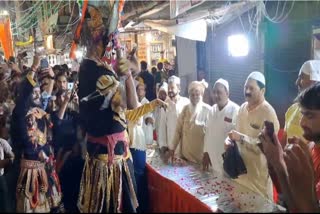 Members from the Muslim community greet the procession