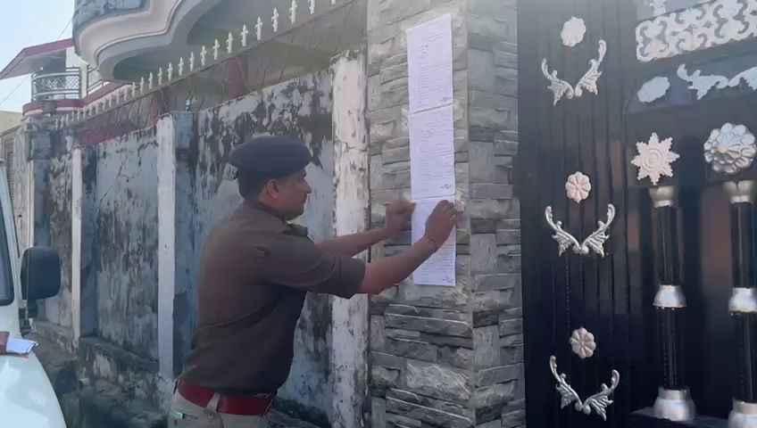 Police Paste Notice on House of Absconding Accused