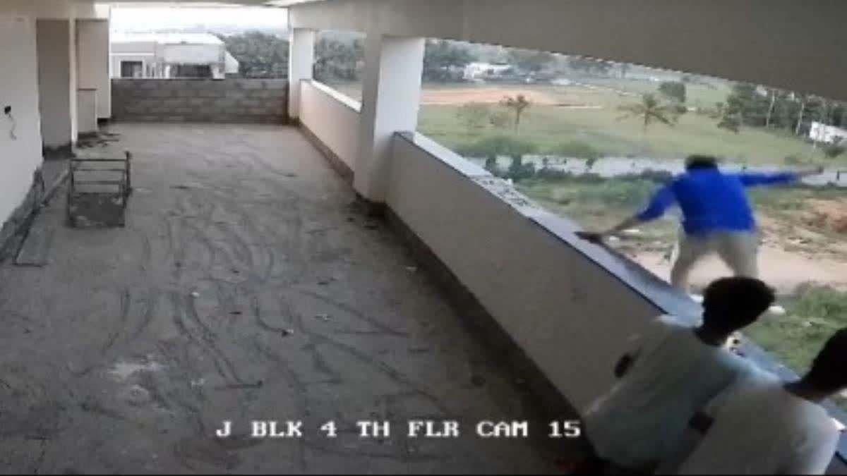 A CCTV grab of Prabu (in blue shirt) jumping off the floor in the hostel