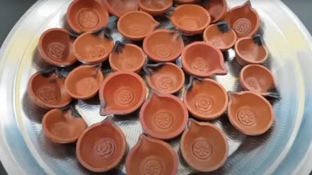 Cleaning Diyas For Diwali