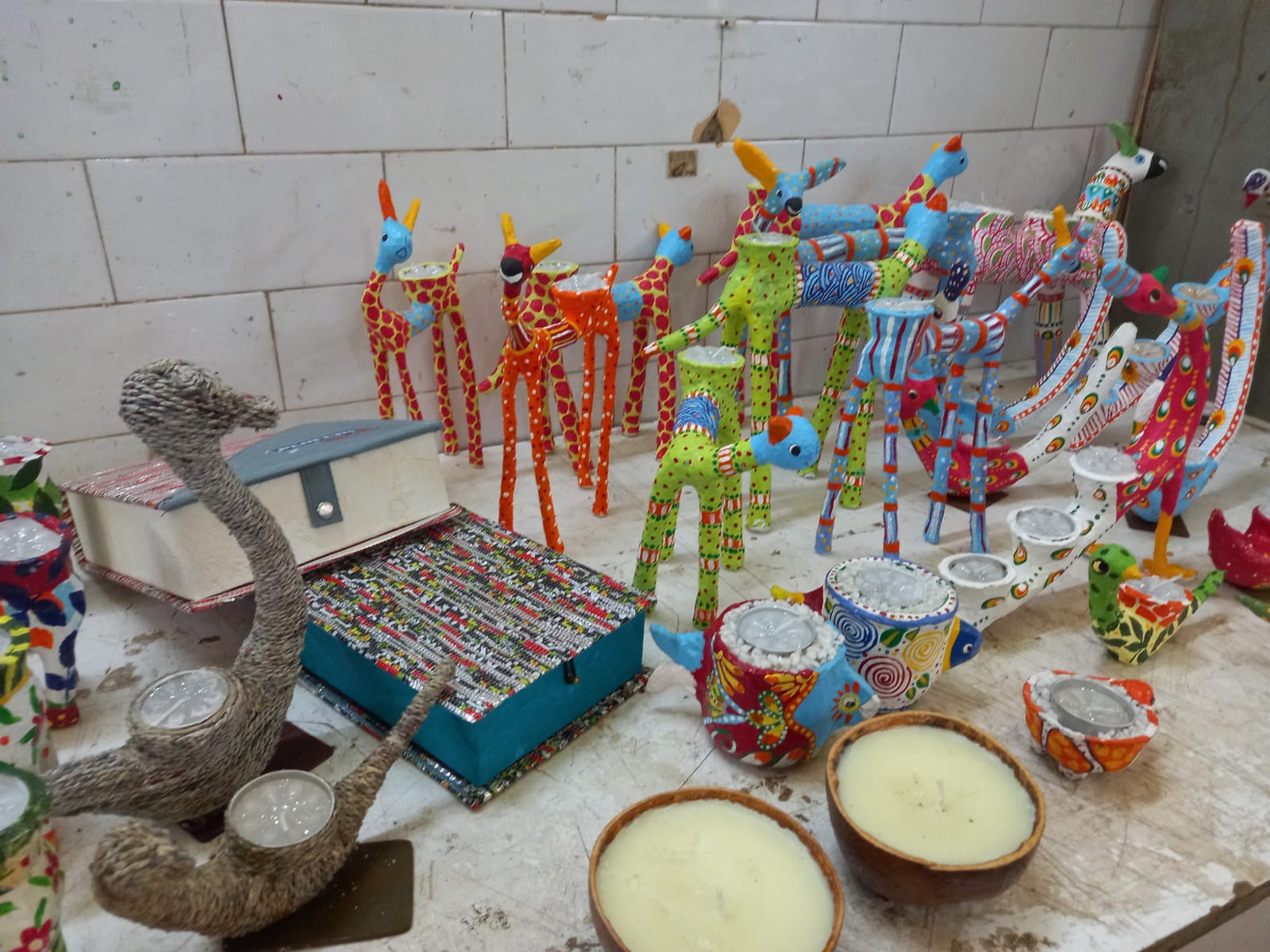 Disabled people are making candle stand from waste cigarette boxes on Diwali, they do something special on every festival