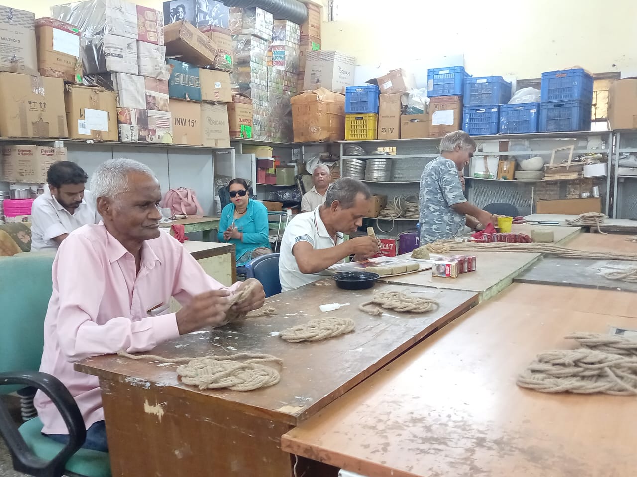 Disabled people are making candle stand from waste cigarette boxes on Diwali, they do something special on every festival